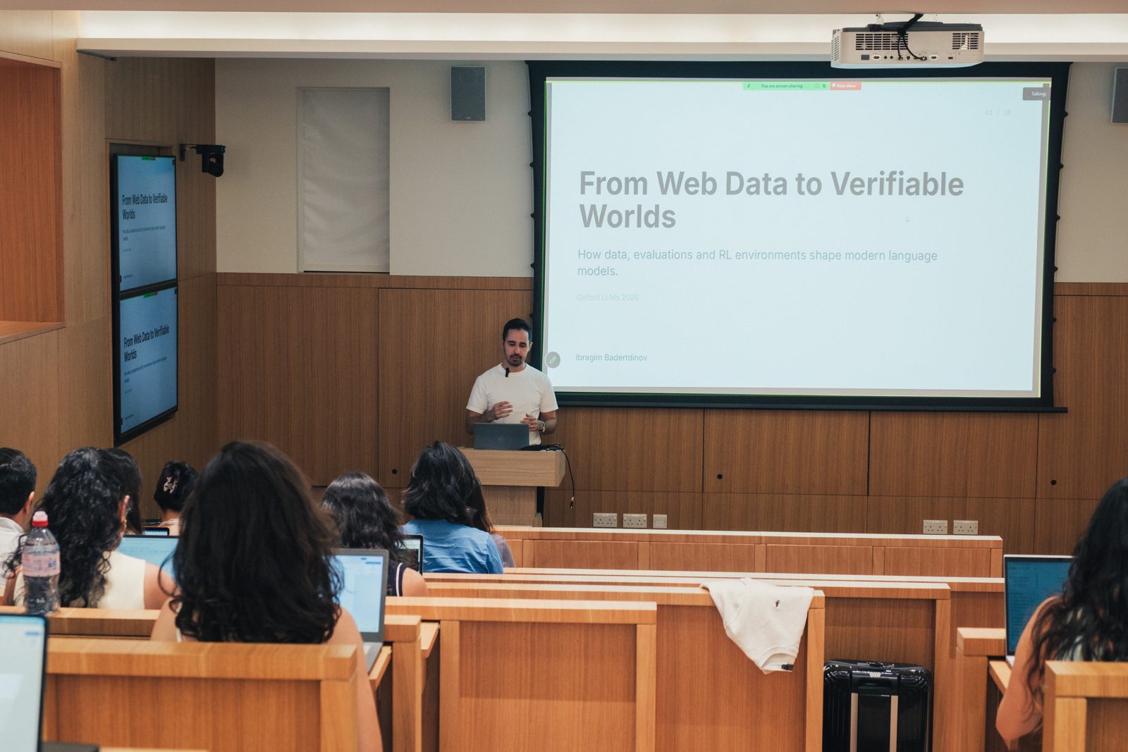 A lecturer presenting to the cohort in the Nuffield College lecture room